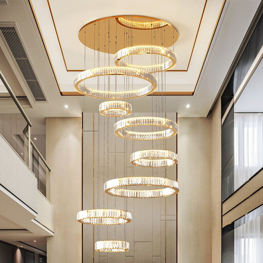 Large chandelier in the middle of the building is modern and minimalist with jumping floors, light luxury, empty living room, crystal lamp, villa duplex floor chandelier
